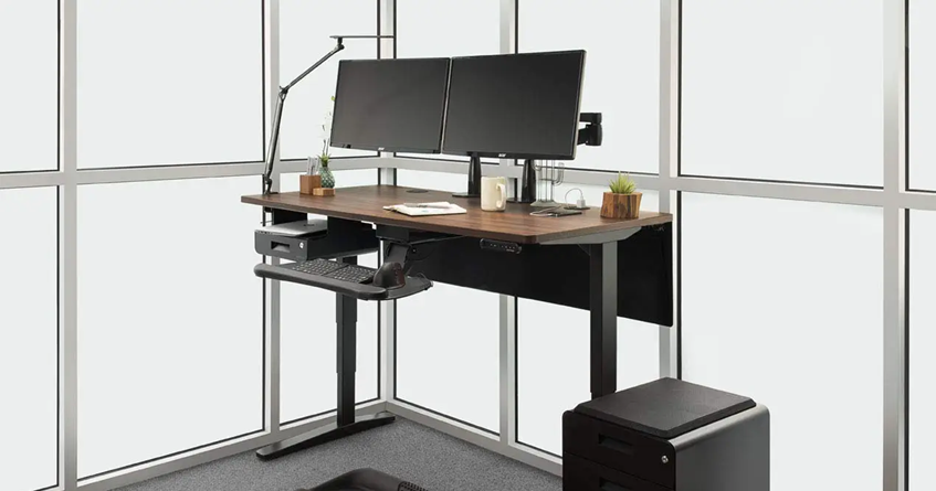 smart home office with a desk a computer and a lamp